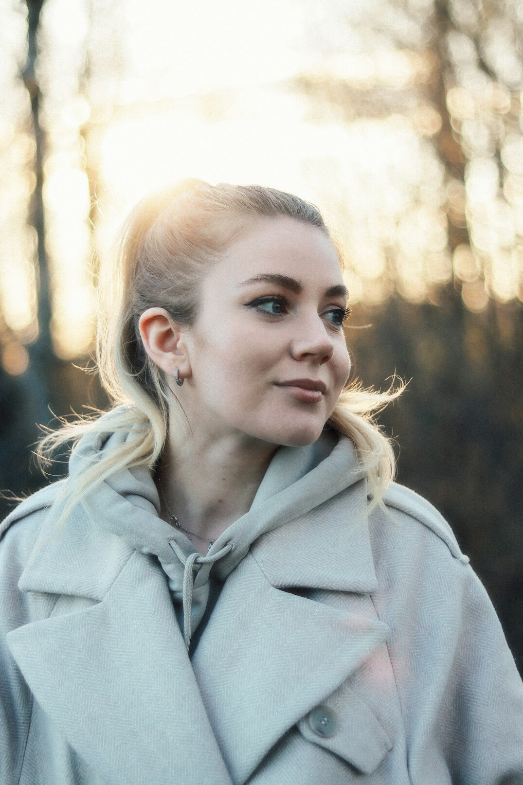 Woman with light hair smiling portrait